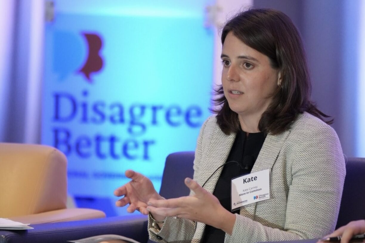 Kate Sitting and Speaking at Governor's Association